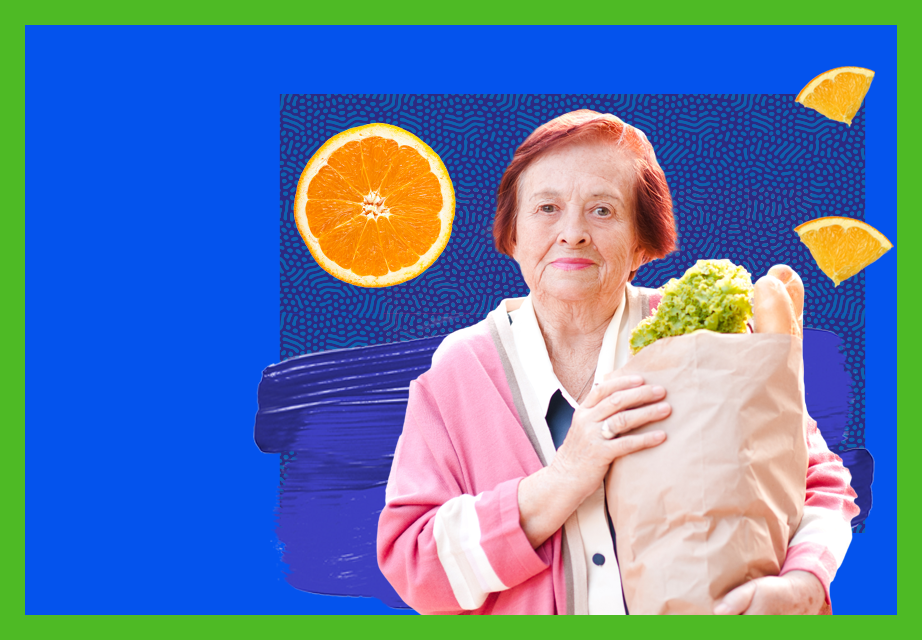 older women holding a bag of groceries smiles on a blue patterned background